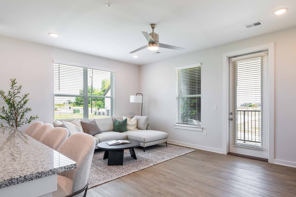 a living room with a couch and a table