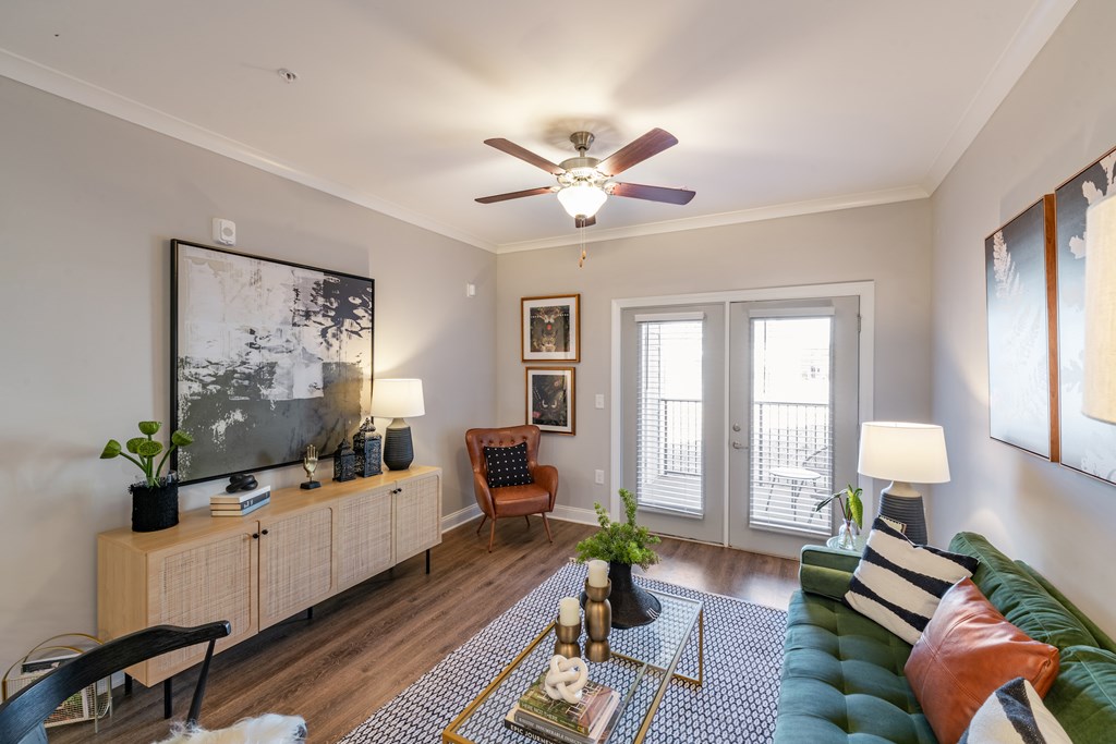 living room with white walls and two french patio doors