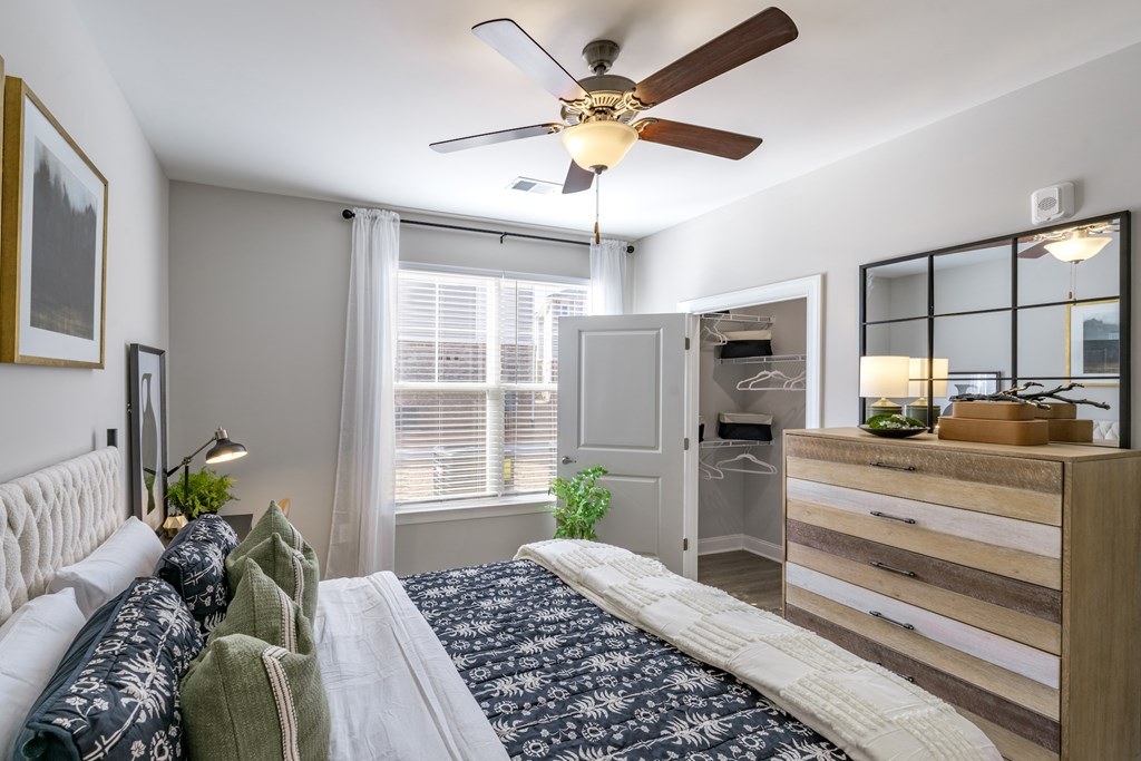 large bedroom with ceiling fan