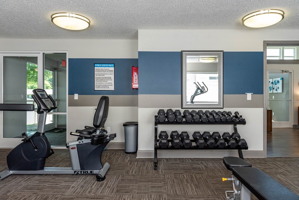 the fitness room at the village apartments