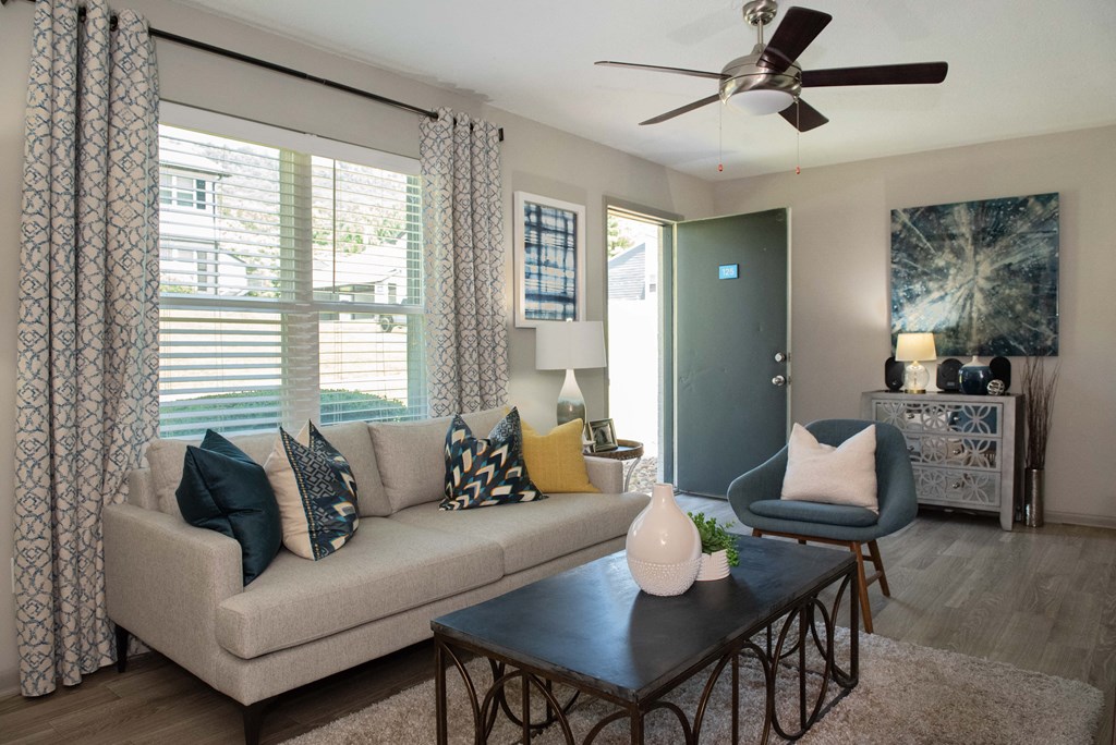 a living room with a couch and a coffee table