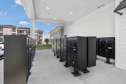 a reflection of a building on the side of a mirrored building