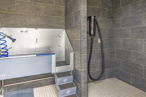 A bathroom with a shower and a bathtub.