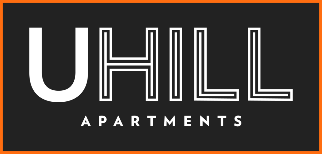 A black and white logo for UHill Apartments.