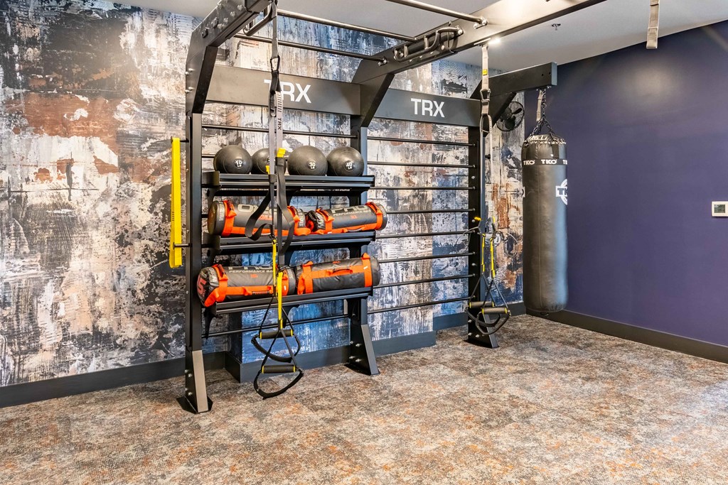 a display of fire equipment in a room with a blue wall
