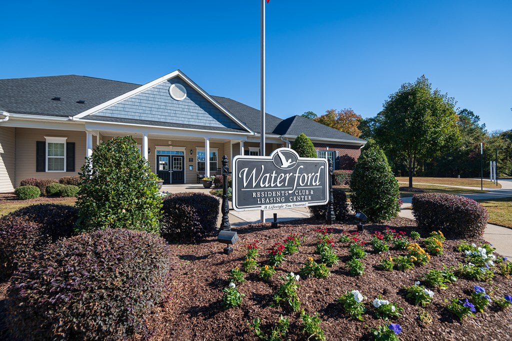 the waterford neighborhood center sign in front of a building
