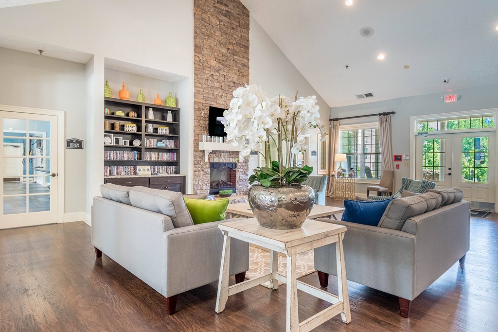 a living room with couches and a table