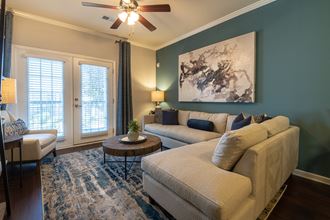 a living room with a couch and a coffee table
