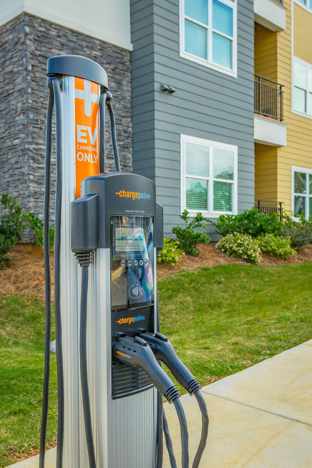 a electric charger in front of a house
