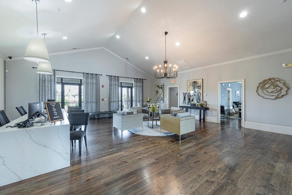 a large living room with a kitchen and a dining room