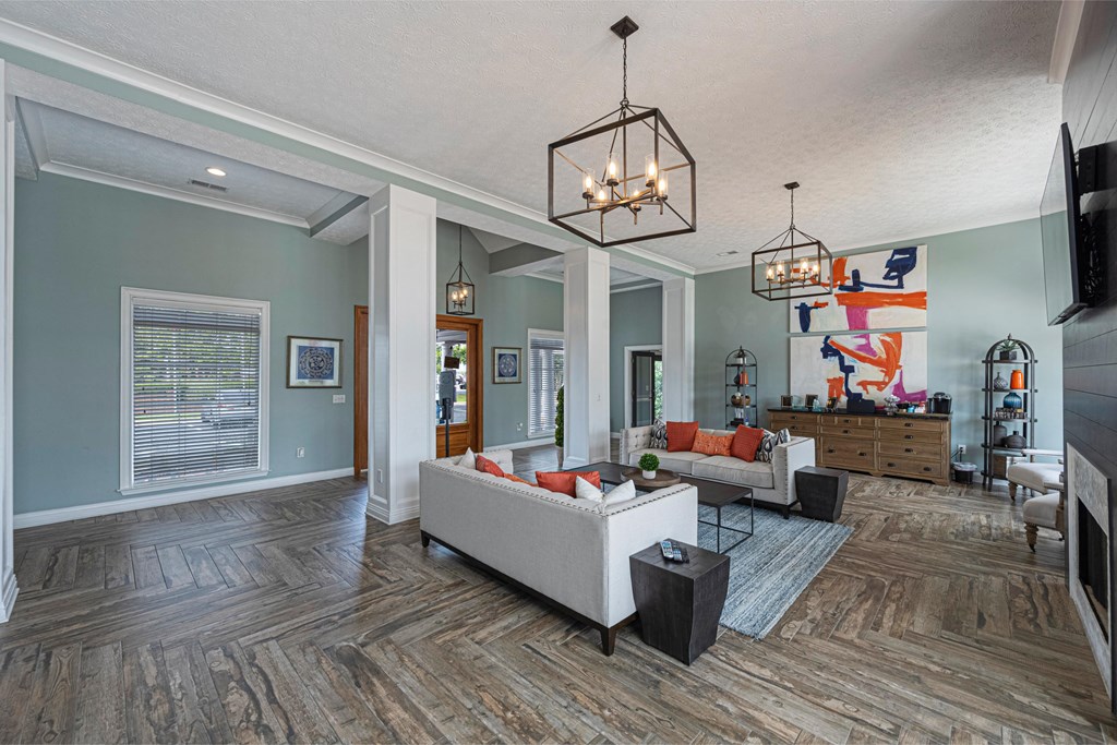 a living room with a couch and a tv