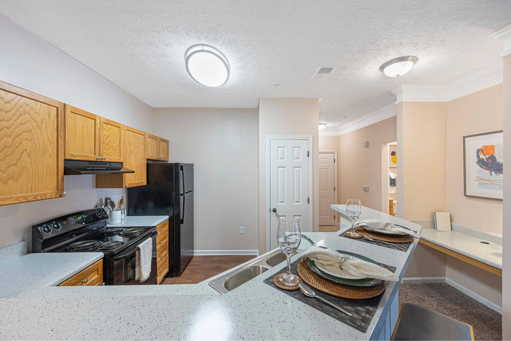 a kitchen with a counter top and a sink