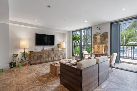 a living room with a couch and a tv