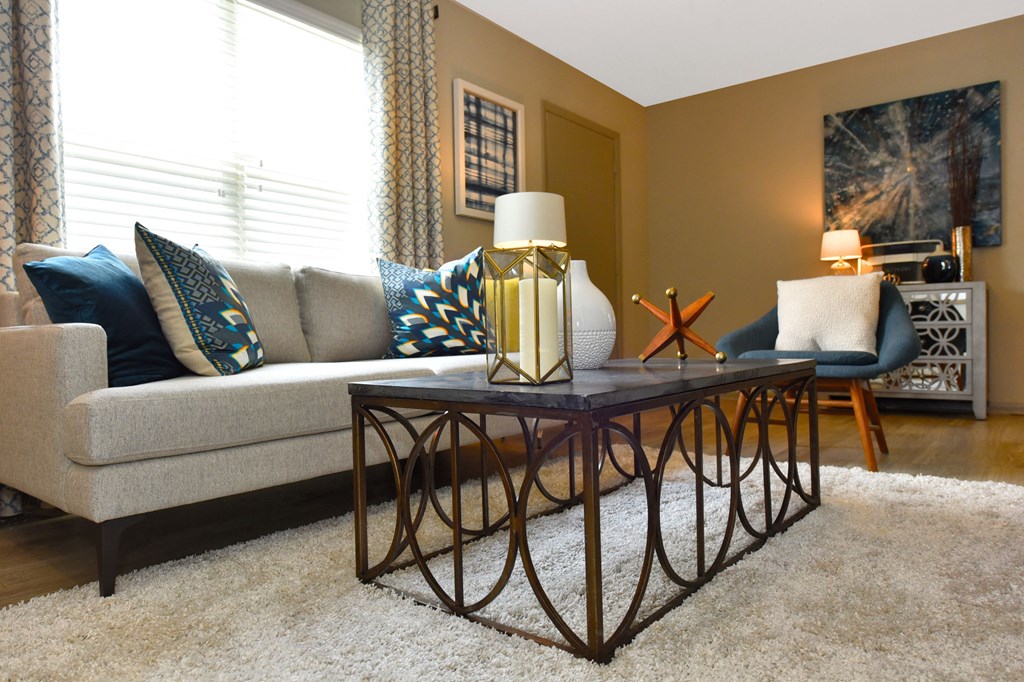 a living room with a couch and a coffee table