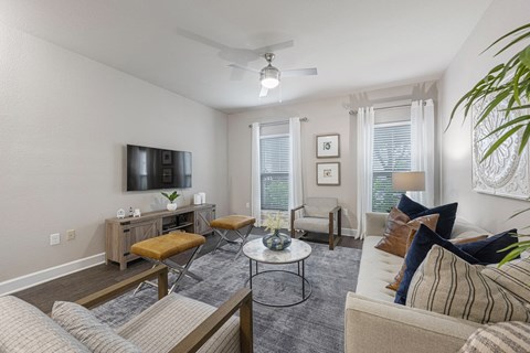 an open living room with a couch and a table