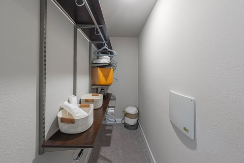 a small bathroom with a sink and a toilet in a closet