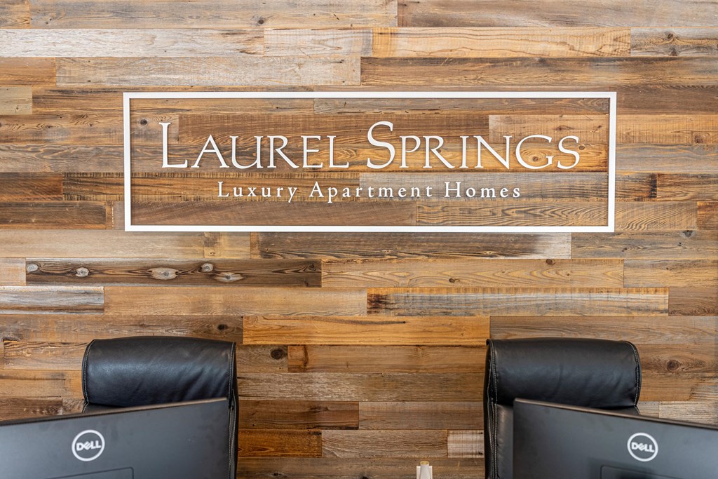 a sign that reads laurel springs luxury apartment homes