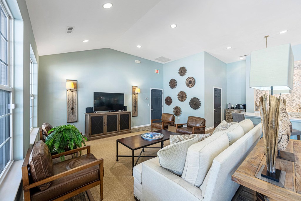 a living room with a couch and a tv