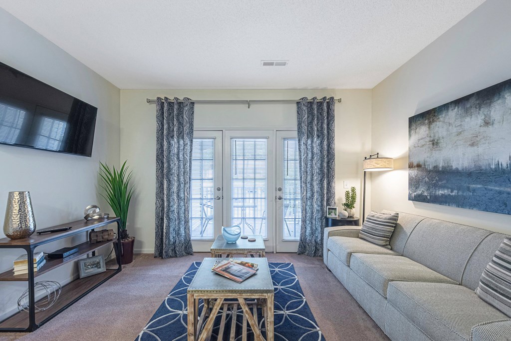 a living room with a couch and a coffee table