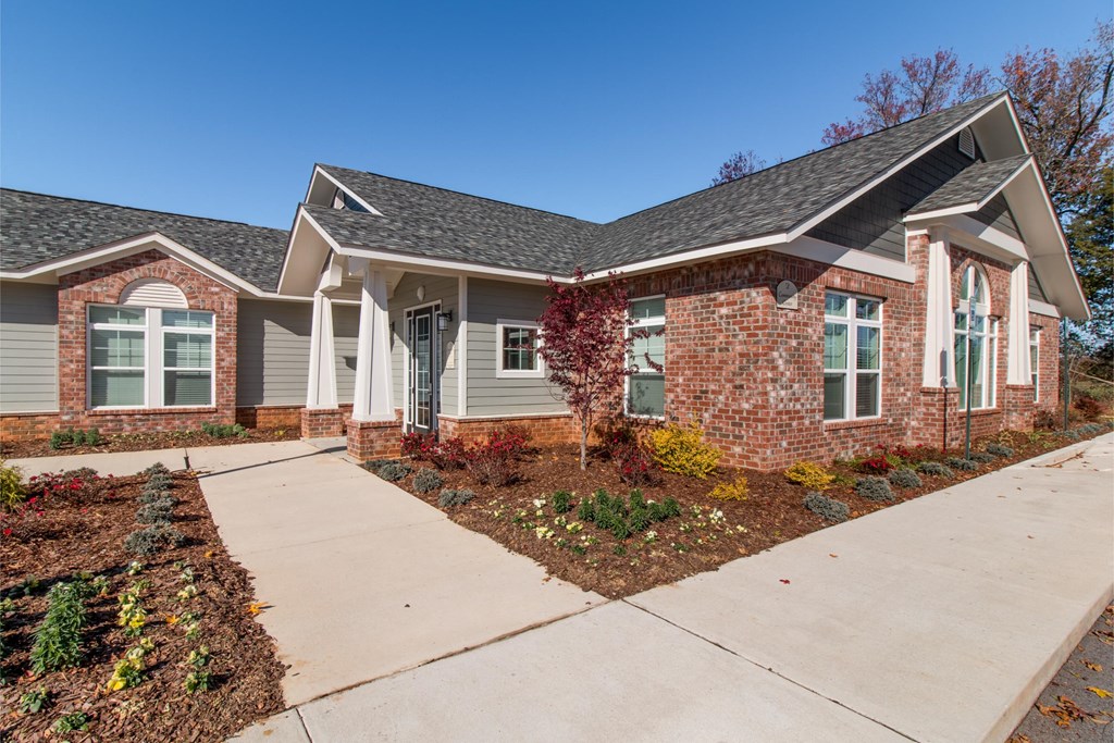 exterior of townhomes with yard