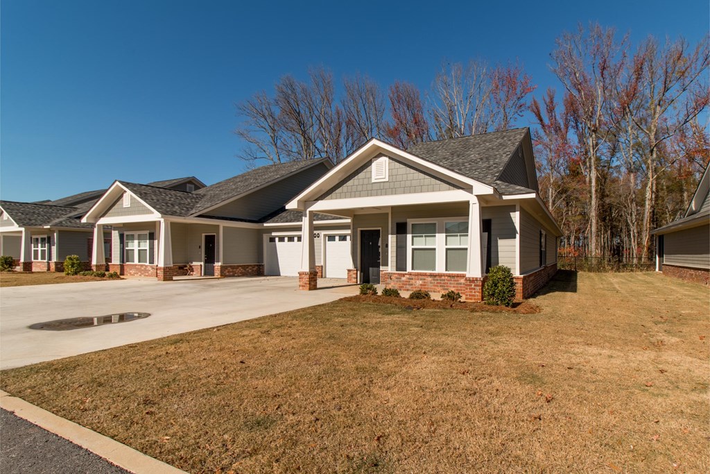 exterior of townhomes with yard