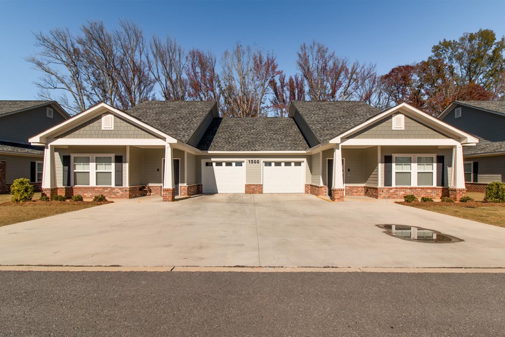 exterior of townhomes with yard