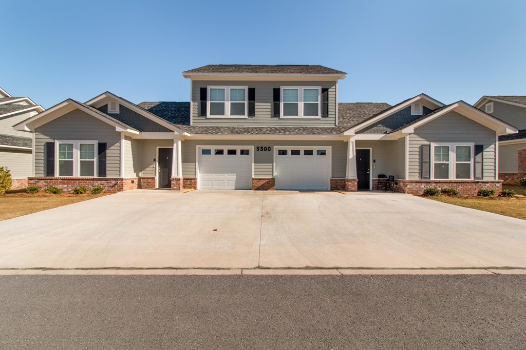 exterior of townhomes with yard