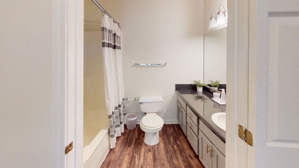 a bathroom with a toilet and a sink