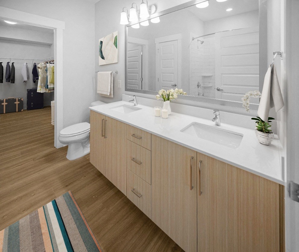 Modern Bathroom with Quartz Countertop, Dual Vanity Sinks, and Large Soaking Tub