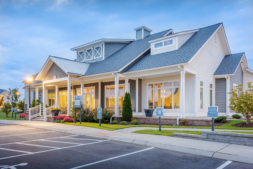 a building with a parking lot in front of it
