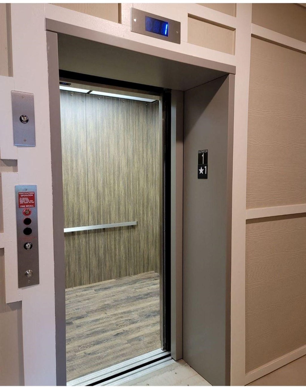 an open door to a elevator in a building