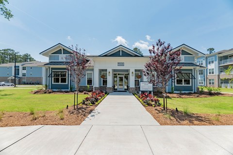 A building with a sign that reads 8000 in front of it.