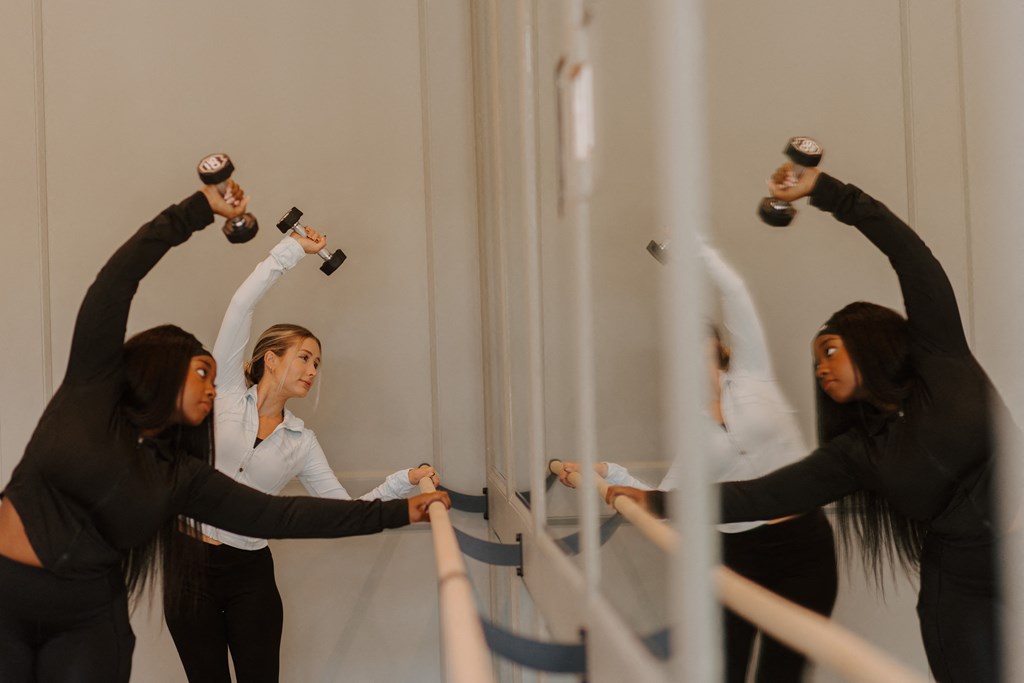 Spacious Fitness Center with Ballet Bars and Free Weights