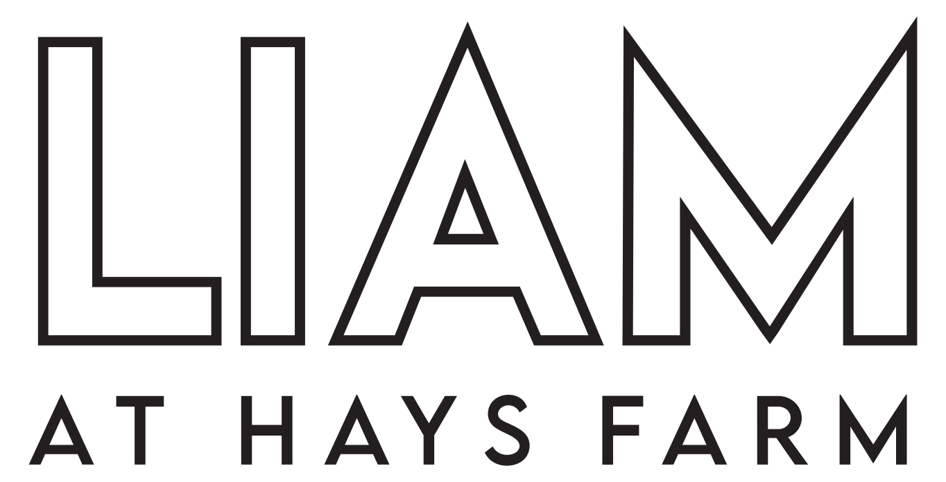 A black and white image of a logo for Liam at Hays Farm.