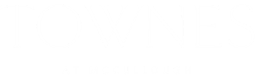 A green sign with white text that says Townes at McCullough.