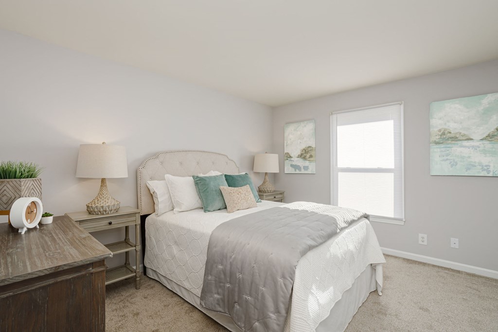 spacious bedroom with carpet