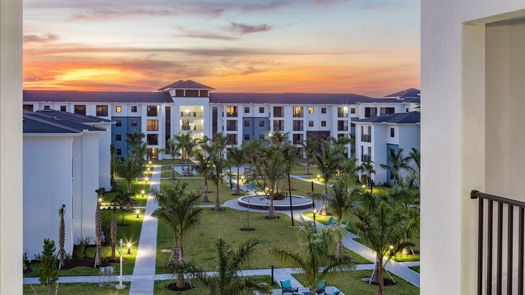 an aerial view of the courtyard at sunset at the resort atrium