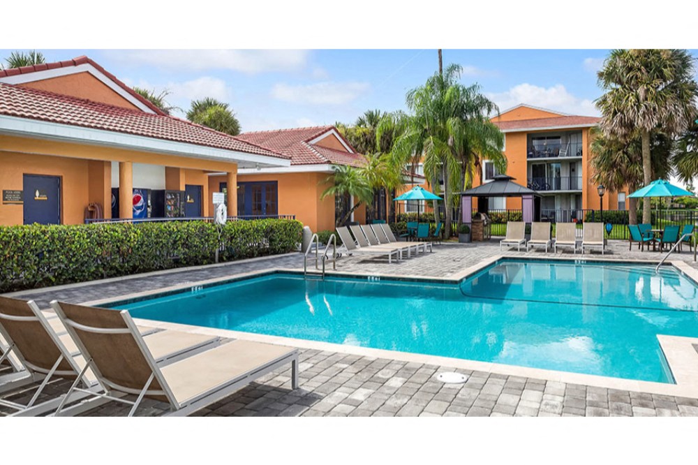 Sparkling swimming pool at Midora at Woodmont in Tamarac, FL