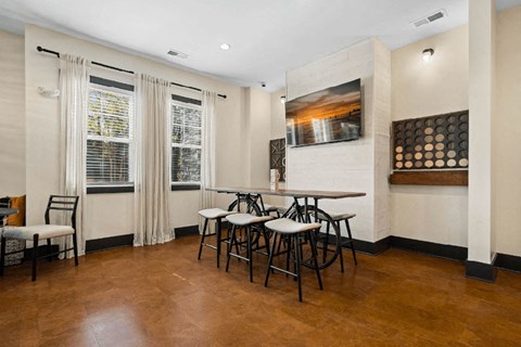 a dining area lounge with coffee bar