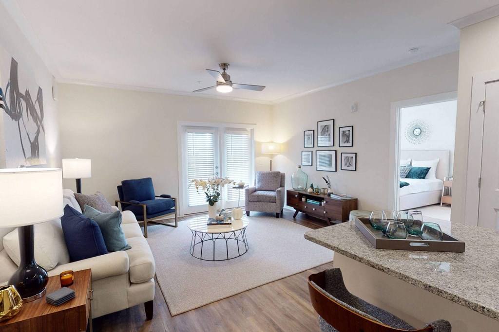 a living room with a couch and a table