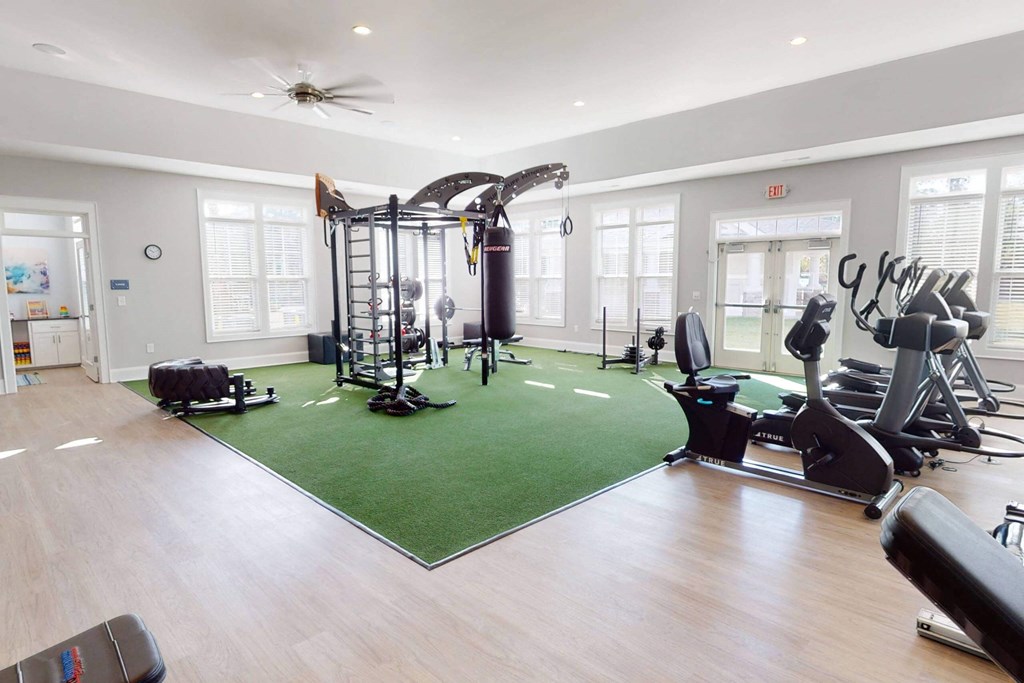 the gym at the flats at big tex apartments