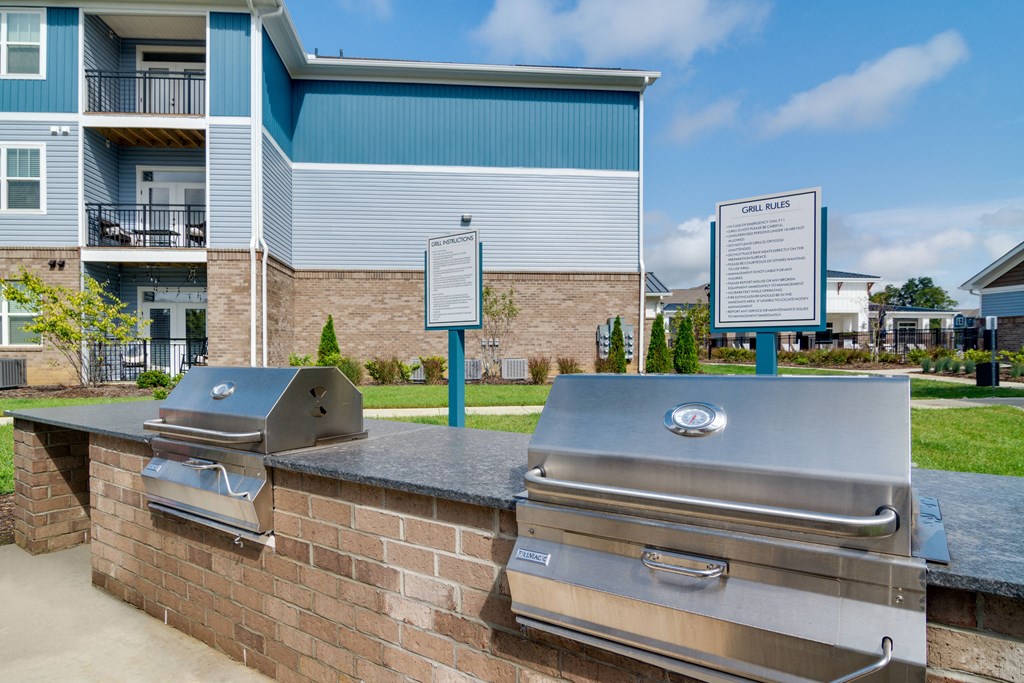 Amenities A wall of grills is in front of a building.