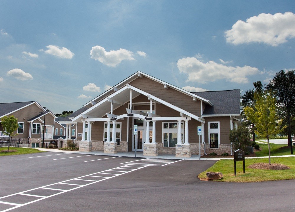 Residential Clubhouse Exterior at Piedmont Place Apartments in Greensboro NC