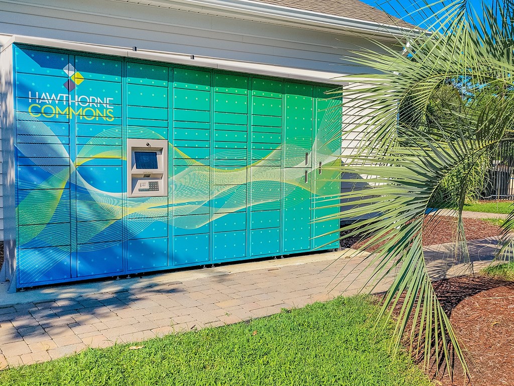 a blue building with a parking meter and a palm tree