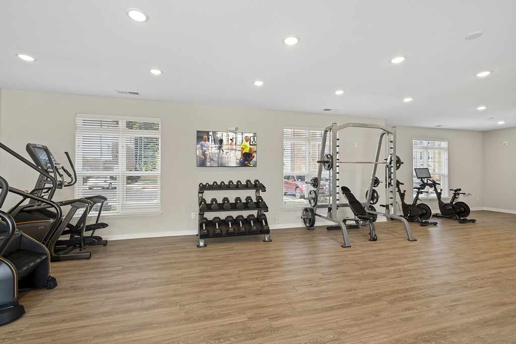 the gym at the enclave at woodbridge apartments in sugar land, tx
