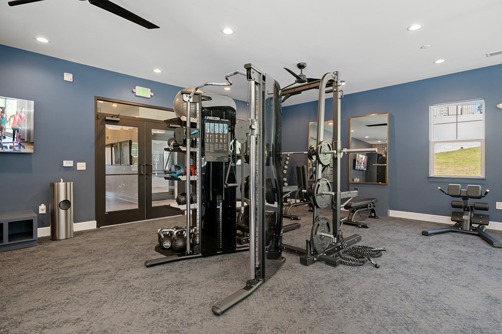 the gym at the enclave at woodbridge apartments in sugar land, tx
