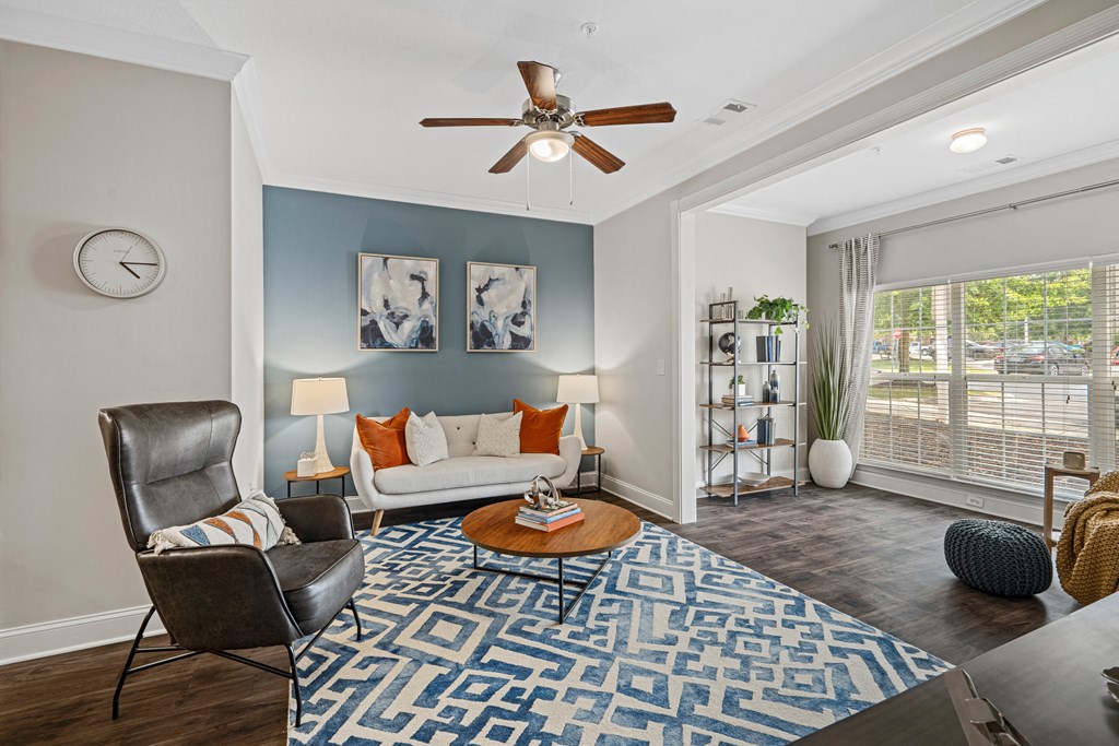 Open Living and Sun Room with Wood-Style Plank Flooring