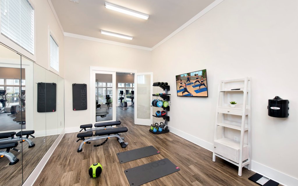 this is a photo of the fitness room in the 690 square foot 1 bedroom apartment at