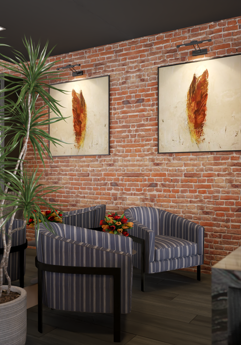 a living room with two chairs and a brick wall