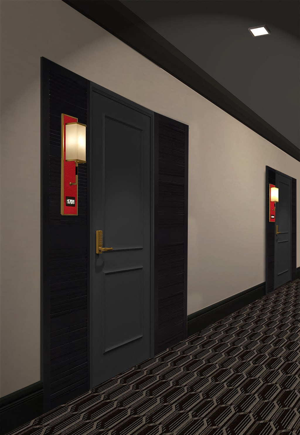 a pair of black doors in a hallway with a red light on the wall